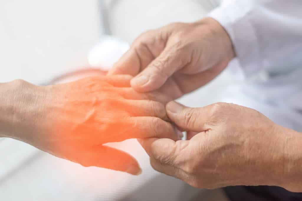 Living With Neuropathy Pain And How to Relieve It 1 Peripheral Neuropathy concept. Doctor neurologist checkup old pa